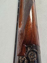 9239
Winchester 101 20 gauge, 26” Barrels, SK/SK, Gold Dama scene, Butt pad, pistol grip with red “W” cap, 13 5/8 LOP, two brass beads, ejectors, ven - 24 of 25