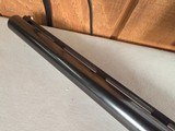 9242
Remington 1100 Special 12 gauge, 2 3/4, straight grip, butt pad, vent rib, 14 1/2 LOP, 20” barrel, semi-auto, mode choked, More pictures at daws - 13 of 25