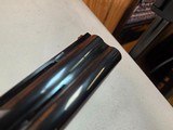 9246
Fair, Jubilee 700, 12 Gauge, Mde in Italy, Full/Full, 30” Barrels, 14 1/2 LOP, Adjustable pad, vent rib, Blue with gold trim, gold single trigge - 20 of 25