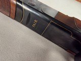 9246
Fair, Jubilee 700, 12 Gauge, Mde in Italy, Full/Full, 30” Barrels, 14 1/2 LOP, Adjustable pad, vent rib, Blue with gold trim, gold single trigge - 12 of 25