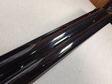 9246
Fair, Jubilee 700, 12 Gauge, Mde in Italy, Full/Full, 30” Barrels, 14 1/2 LOP, Adjustable pad, vent rib, Blue with gold trim, gold single trigge - 21 of 25