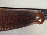 9246
Fair, Jubilee 700, 12 Gauge, Mde in Italy, Full/Full, 30” Barrels, 14 1/2 LOP, Adjustable pad, vent rib, Blue with gold trim, gold single trigge - 24 of 25