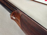 9246
Fair, Jubilee 700, 12 Gauge, Mde in Italy, Full/Full, 30” Barrels, 14 1/2 LOP, Adjustable pad, vent rib, Blue with gold trim, gold single trigge - 15 of 25