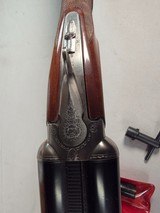 9255 Winchester Model 23 XTR Pigeon grade, 12 Gauge, 3” Chambers, 6 Screw in Winchokes, (F, XF, M, IM, S, IC), with pouches and choke tool, vent rib, - 16 of 25