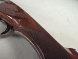 9257
Winchester Model 23 XTR Pigeon grade Side by side shotgun, 20 Gauge, IC/MOD choked, Round Knob, Butt pad, Single Selective trigger, vent rib, 26 - 6 of 24