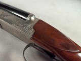 9257
Winchester Model 23 XTR Pigeon grade Side by side shotgun, 20 Gauge, IC/MOD choked, Round Knob, Butt pad, Single Selective trigger, vent rib, 26 - 7 of 24
