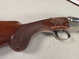 9257
Winchester Model 23 XTR Pigeon grade Side by side shotgun, 20 Gauge, IC/MOD choked, Round Knob, Butt pad, Single Selective trigger, vent rib, 26 - 21 of 24