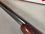 9257
Winchester Model 23 XTR Pigeon grade Side by side shotgun, 20 Gauge, IC/MOD choked, Round Knob, Butt pad, Single Selective trigger, vent rib, 26 - 10 of 24