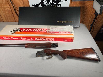 9262 Winchester 101 Ruffed Grouse Society, 20 Gauge, 26” barrels, IC/MOD, round knob, vent rib, butt pad, 14 1/4 LOP, fancy tiger stripped fancy waln