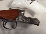 9259
Winchester Model 23 Pigeon XTR, 20 Gauge, 26” barrels, IC/MOD, Round Knob, Ejectors, vent rib, butt pad, coin silver receiver, beaver tail, 14 1 - 12 of 25