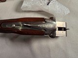 9259
Winchester Model 23 Pigeon XTR, 20 Gauge, 26” barrels, IC/MOD, Round Knob, Ejectors, vent rib, butt pad, coin silver receiver, beaver tail, 14 1 - 16 of 25
