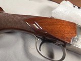9259
Winchester Model 23 Pigeon XTR, 20 Gauge, 26” barrels, IC/MOD, Round Knob, Ejectors, vent rib, butt pad, coin silver receiver, beaver tail, 14 1