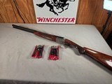 9263
Winchester 23 Pigeon XTR 2 3/4 and 3”, 12 Gauge, 26” barrels, round knob, 100% factory original, butt pad, vent rib, screw in Winchokes( Sk,IC, - 3 of 25
