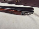 9264
Winchester 23 Classic 410 gauge, 26” barrels, Mod/Full, ejectors, single selective trigger, Gold quail on bottom, pistol grip with cap, all fact - 20 of 25