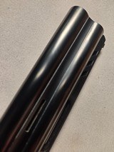 9261
Winchester 101 lightweight 20 Gauge, 27” barrels, 2 screw in Winchokes, IC/MOD, vent rib, round knob, 14 1/4 LOP, Comes with the correct box and - 24 of 25