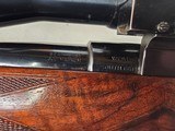 9272
Weatherby 300 Weatherby Mag, 90 Mauser, walnut ebony tip, early Weatherby 300, grip cap, Gunther and Howe receiver, scope mount, detachable, Wea - 14 of 25