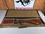 9273
Winchester Model 23 pigeon XTR Lightweight, 20 gauge, 3” chambers, vet rib, 25.5” barrels, IC/Mod, straight grip, 14 1/4 lop, Winchester butt pa