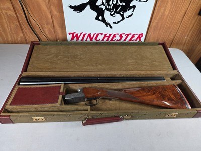 9273
Winchester Model 23 pigeon XTR Lightweight, 20 gauge, 3” chambers, vet rib, 25.5” barrels, IC/Mod, straight grip, 14 1/4 lop, Winchester butt pa