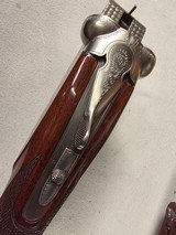 9274
Winchester model 23 XTR Pigeon Grade, 12 Gauge, 3” chambers, round knob, Mod/Full, vent rib, 28” barrels, white line butt pad, 14 1/4 LOP, Green - 12 of 25