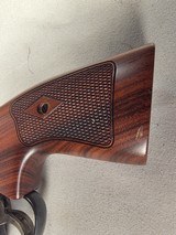 9276
Smith and Wesson 57-6, 41 Magnum, 6” barrel, Hi-Viz red camp front sight, N Target Frame, 6 shot, Micrometer rear, special oversized grips, shro - 2 of 19