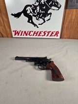 9276
Smith and Wesson 57-6, 41 Magnum, 6” barrel, Hi-Viz red camp front sight, N Target Frame, 6 shot, Micrometer rear, special oversized grips, shro