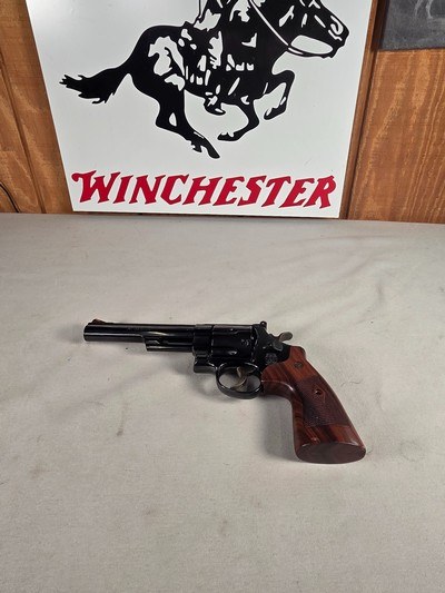 9276
Smith and Wesson 57-6, 41 Magnum, 6” barrel, Hi-Viz red camp front sight, N Target Frame, 6 shot, Micrometer rear, special oversized grips, shro