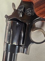 9276
Smith and Wesson 57-6, 41 Magnum, 6” barrel, Hi-Viz red camp front sight, N Target Frame, 6 shot, Micrometer rear, special oversized grips, shro - 4 of 19