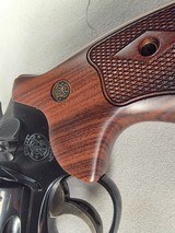 9276
Smith and Wesson 57-6, 41 Magnum, 6” barrel, Hi-Viz red camp front sight, N Target Frame, 6 shot, Micrometer rear, special oversized grips, shro - 3 of 19