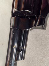 9276
Smith and Wesson 57-6, 41 Magnum, 6” barrel, Hi-Viz red camp front sight, N Target Frame, 6 shot, Micrometer rear, special oversized grips, shro - 5 of 19