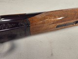 9277 Browning BSS 12 Gauge, 26” Barrels, IC/Mod, single non selective trigger, pistol grip, 14 1/4 LOP,
Pachmayer white line pad, AA++ tiger stripped - 22 of 25