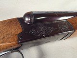 9277 Browning BSS 12 Gauge, 26” Barrels, IC/Mod, single non selective trigger, pistol grip, 14 1/4 LOP,
Pachmayer white line pad, AA++ tiger stripped - 23 of 25
