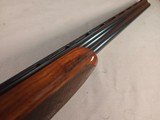 9280
Winchester 101 Pigeon grade, 20 Gauge, 27 barrels, SK/SK, AAA+ fancy highly figured walnut, vent rib, pistol grip, Pachmayer white line pad, LOP - 20 of 25