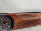 9289
Weatherby Regency 12 Gauge, over and under,
2 3/4 chambers, side lock, IM/F fixed chokes, Greener cross bolt, gold trigger, 28” barrels, pistol - 22 of 25