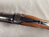 9289
Weatherby Regency 12 Gauge, over and under,
2 3/4 chambers, side lock, IM/F fixed chokes, Greener cross bolt, gold trigger, 28” barrels, pistol - 16 of 25