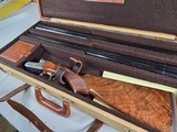 9290
SKB 385 Ducks Unlimited 2 barrel set, Only 200 were Made, 20 gauge and 28 Gauge, The stock is American walnut in high gloss finish with a semi- - 3 of 25