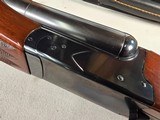 9298 Winchester Model 23 Custom, 12 Gauge, 27” Barrels, looks like a model 21, made in 1987,14 1/4 LOP, 7 screw in chokes, M,F, XF, 2-IC, IM, pistol