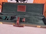 9299Merkel Green with leather Shotgun trunk style hard case. Will fit up to a 30” Barrel, these are getting harder to find!. Has blocks. More pictur - 11 of 19