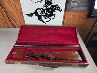9316 Winchester Model 23 classic, 410 Gauge, 26” barrels, Mod/full chokes, pistol grip with cap, Winchester butt bad, gold quail, gold trigger, vent r