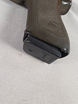 9327Glock model 17, faded OD Green,semi auto pistol 9mm ( 9x19), one 17 round magazine, fixed sites, all original, SN# HV602,More pictures at Da - Image 3 of 17