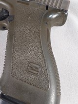 9327Glock model 17, faded OD Green,semi auto pistol 9mm ( 9x19), one 17 round magazine, fixed sites, all original, SN# HV602,More pictures at Da - Image 2 of 17