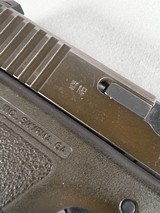 9327Glock model 17, faded OD Green,semi auto pistol 9mm ( 9x19), one 17 round magazine, fixed sites, all original, SN# HV602,More pictures at Da - Image 13 of 17