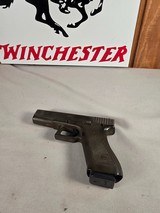 9327Glock model 17, faded OD Green,semi auto pistol 9mm ( 9x19), one 17 round magazine, fixed sites, all original, SN# HV602,More pictures at Da - Image 1 of 17