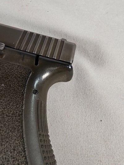 9327Glock model 17, faded OD Green,semi auto pistol 9mm ( 9x19), one 17 round magazine, fixed sites, all original, SN# HV602,More pictures at Da - Image 4 of 17