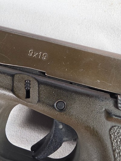 9327Glock model 17, faded OD Green,semi auto pistol 9mm ( 9x19), one 17 round magazine, fixed sites, all original, SN# HV602,More pictures at Da - Image 6 of 17