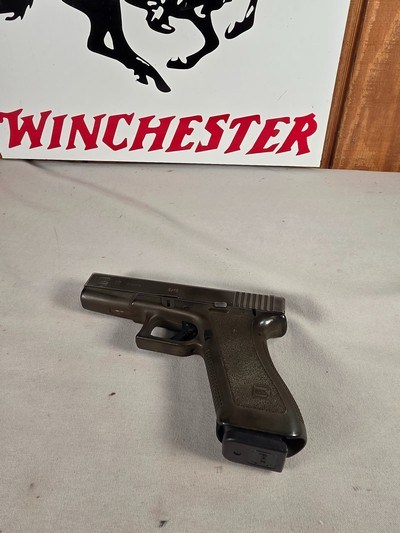 9327Glock model 17, faded OD Green,semi auto pistol 9mm ( 9x19), one 17 round magazine, fixed sites, all original, SN# HV602,More pictures at Da - Image 1 of 17
