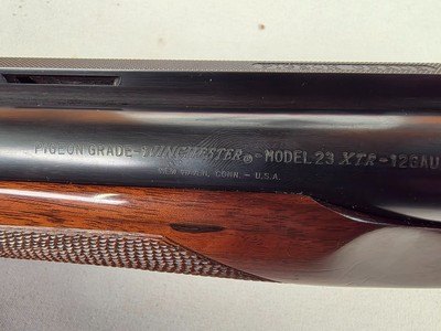 9333Winchester 23 pigeon XTR, 12 gauge, 3” chambers, butt plate, round knob, ejectors, IC/ Mod, 14 1/4 LOP, 26” Barrels, Vent rib,More pictures at - Image 17 of 25