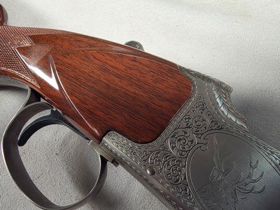 9340Winchester Grand European XTR over under Rifle, 30/06 over 30/06, made in 1994-1985, 23 1/3 blue steel barrel with iron sights and claw scope mo - Image 12 of 25