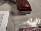 9350Ruger Red Hawk 45 Colt Auto, 4” Barrel, Wood Grips, adjustable site, revolver, stainless, With original plastic case, paperwork. More pictures a - Image 6 of 17