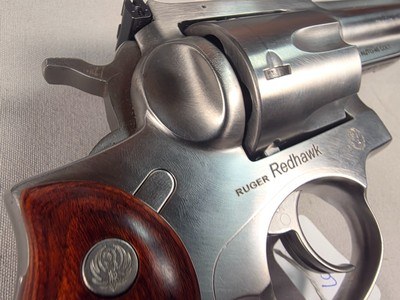 9350Ruger Red Hawk 45 Colt Auto, 4” Barrel, Wood Grips, adjustable site, revolver, stainless, With original plastic case, paperwork. More pictures a - Image 12 of 17