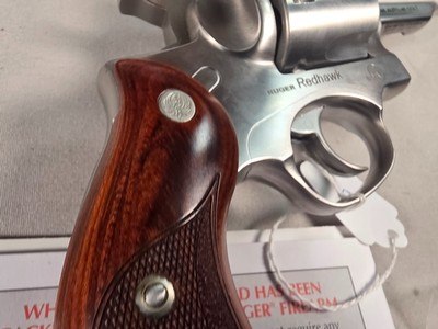 9350Ruger Red Hawk 45 Colt Auto, 4” Barrel, Wood Grips, adjustable site, revolver, stainless, With original plastic case, paperwork. More pictures a - Image 17 of 17